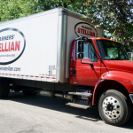 Warners' Stellian delivery truck outside.